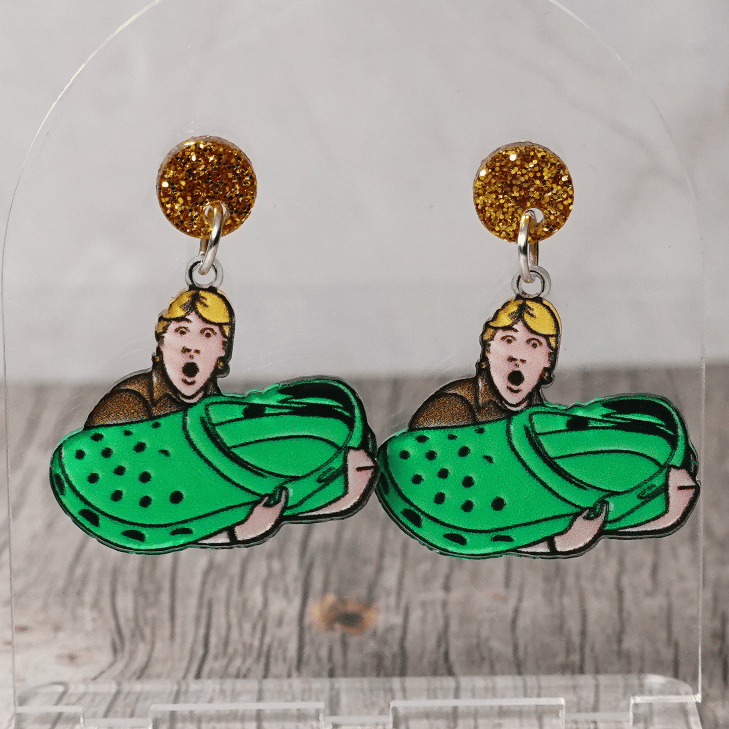 Novelty dangle earrings showing Steve Irwin holding an oversized green clog shoe
