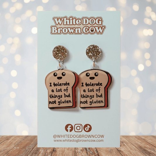 Acrylic dangle earrings shaped like a slice of bread with text reading “I tolerate a lot of things but not gluten”