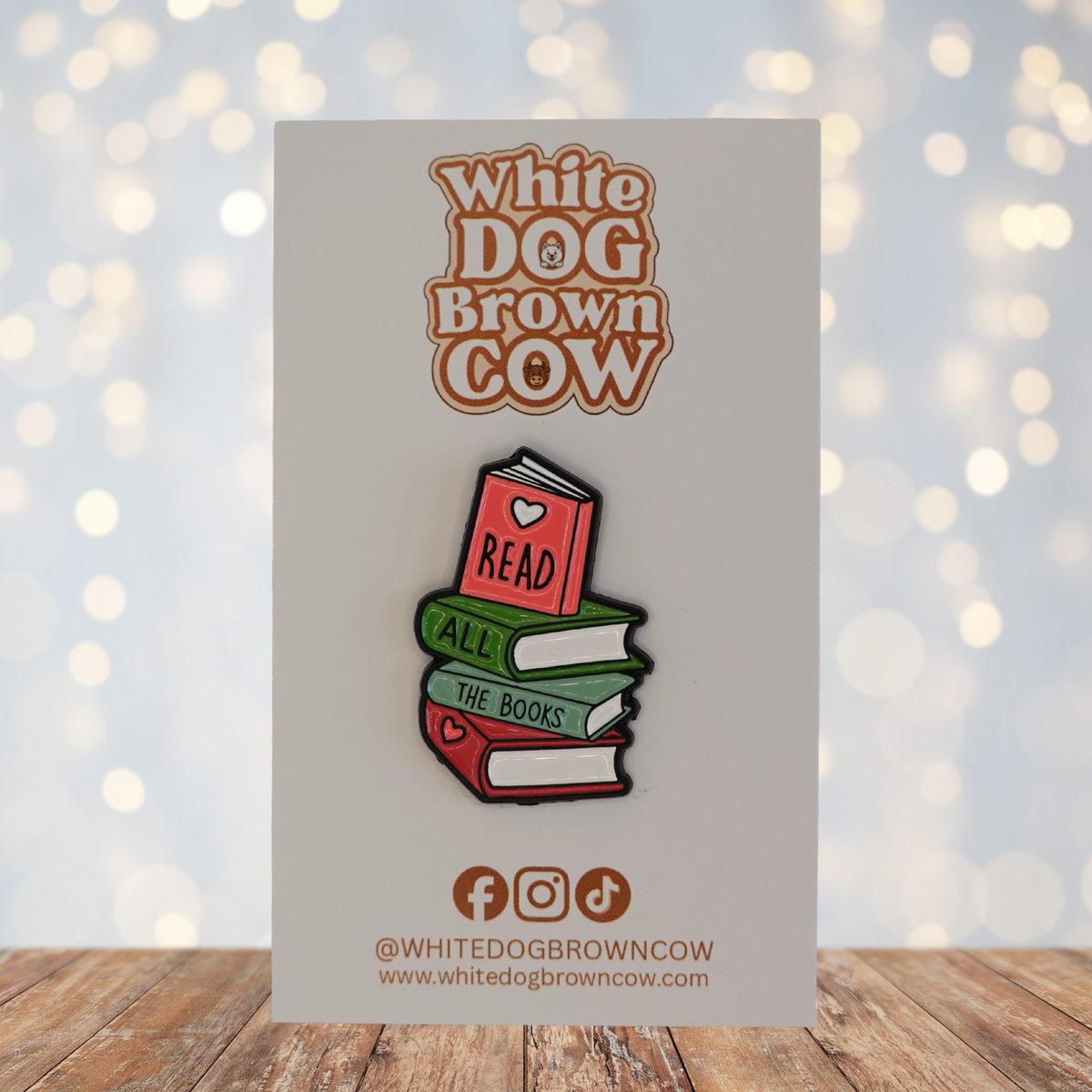 Read Riordan Pins Read All The Books Enamel Pin – White Dog Brown Cow