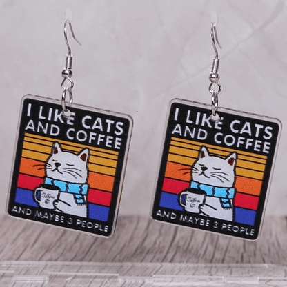 Square dangle earrings with cat holding coffee mug and text “I like cats and coffee and maybe 3 people”