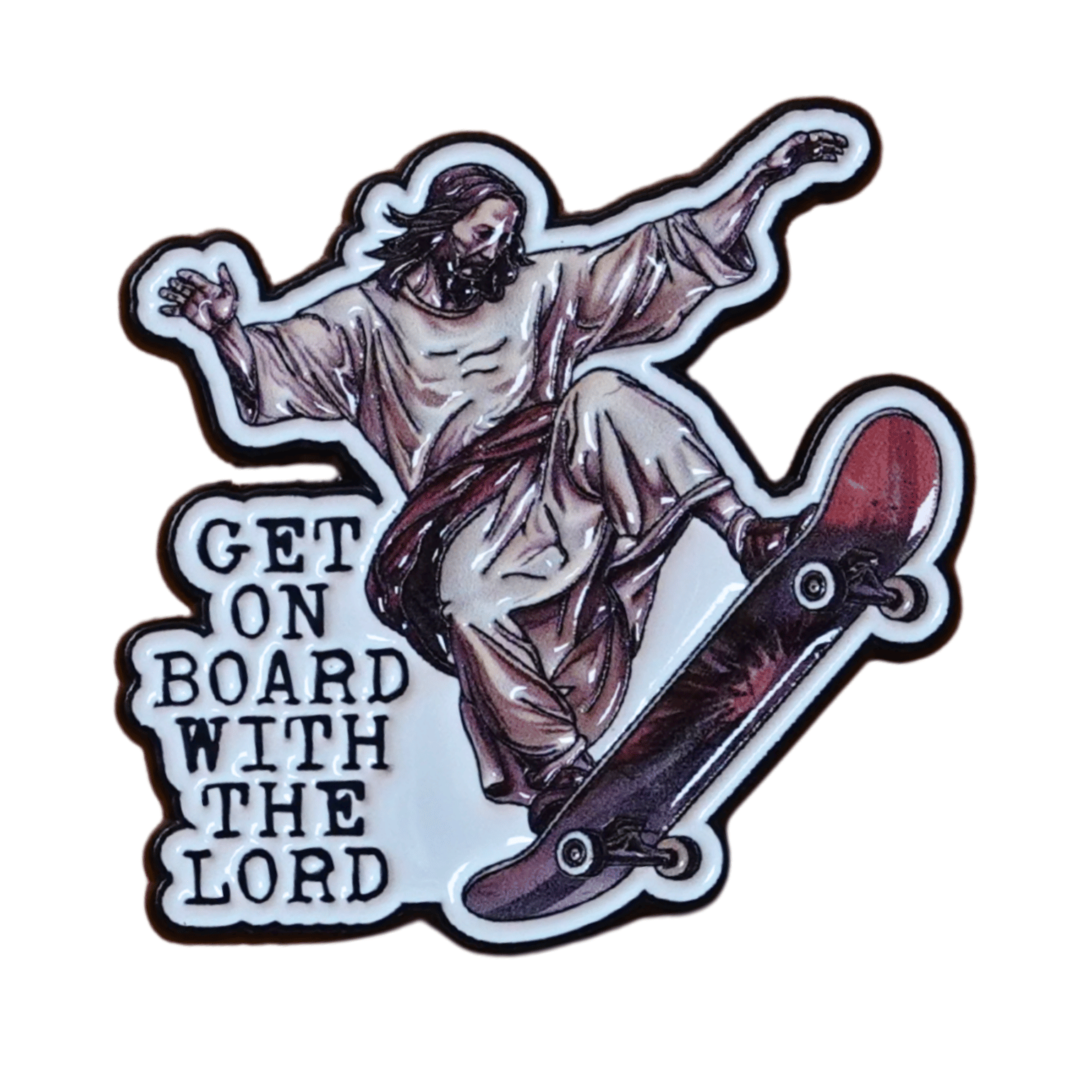 Enamel pin of Jesus riding a skateboard with the phrase “Get On Board With The Lord,” funny religious humor skateboarding lapel pin.