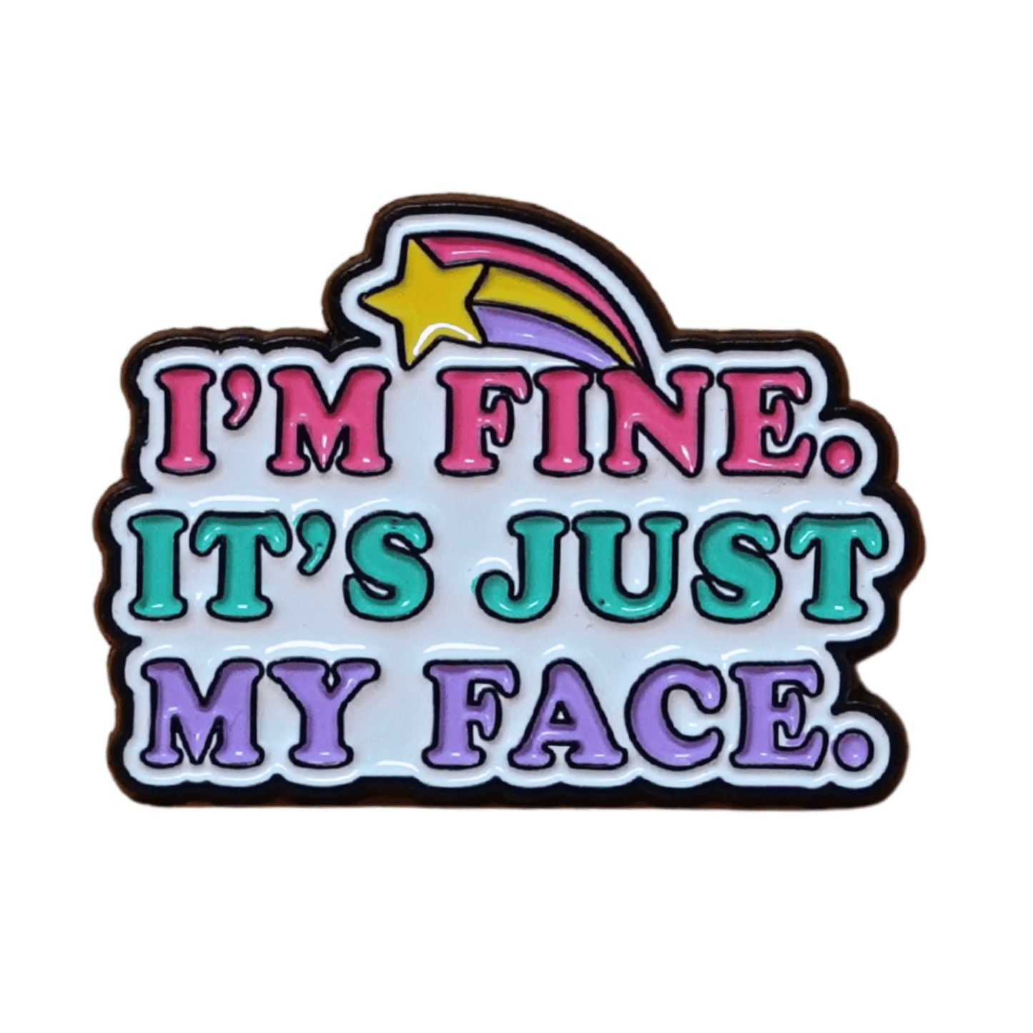 Colorful enamel pin reading “I’m Fine, It’s Just My Face” with retro pink, teal and purple lettering and shooting star detail, funny sarcastic lapel pin.