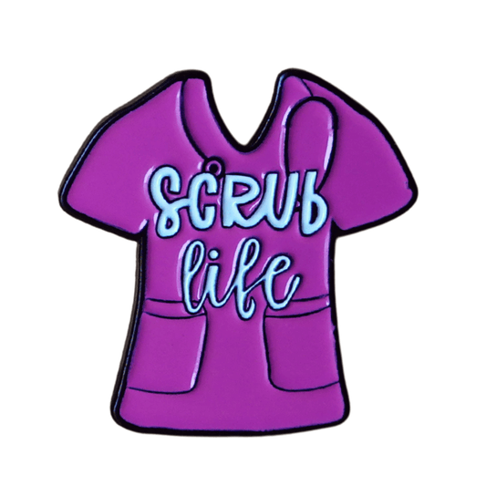 Funny “Scrub Life” enamel pin shaped like medical scrubs for nurses and healthcare workers