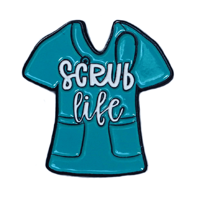 Funny “Scrub Life” enamel pin shaped like teal medical scrubs for nurses and healthcare workers