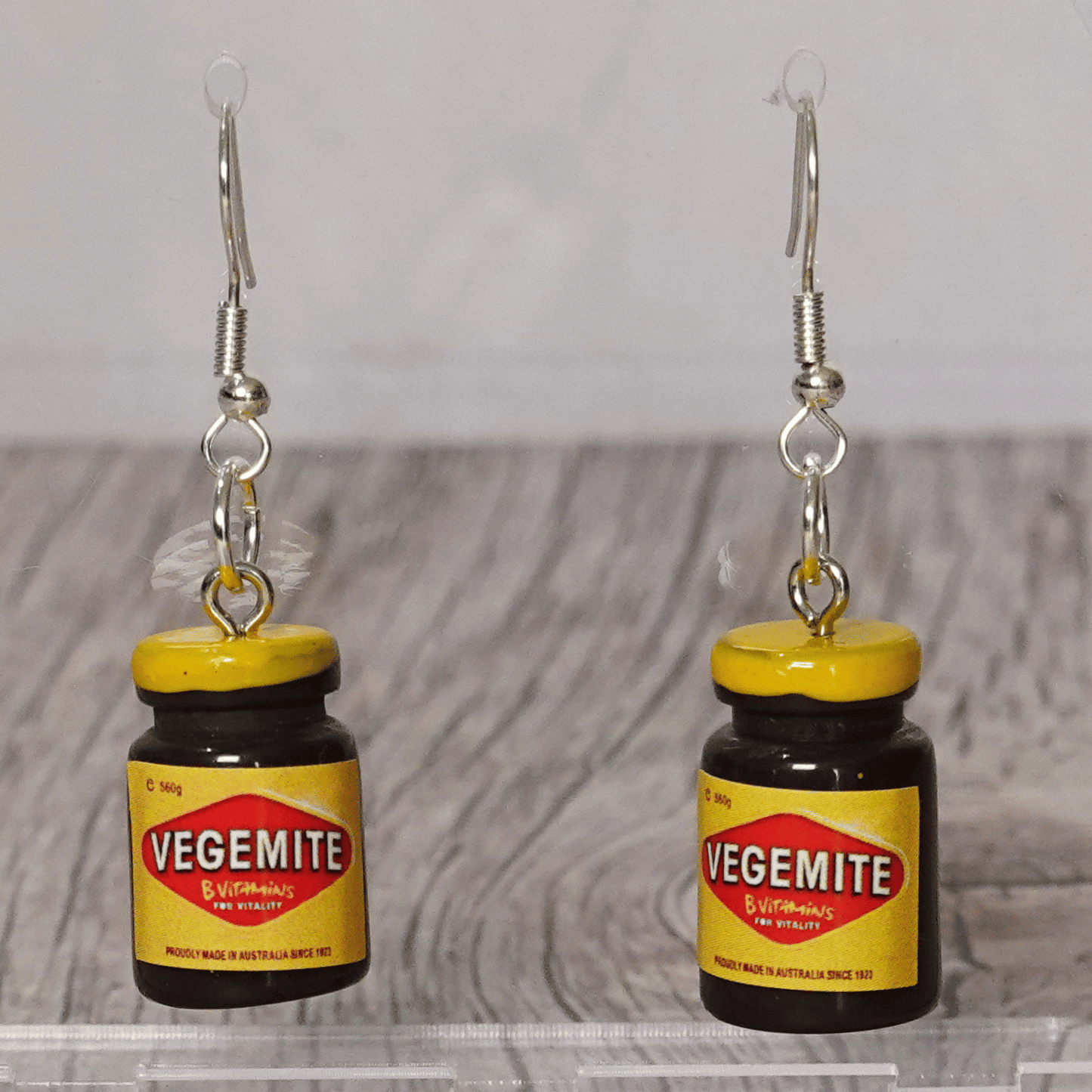 Mini Vegemite jar novelty dangle earrings with silver hooks, inspired by the classic Australian spread.