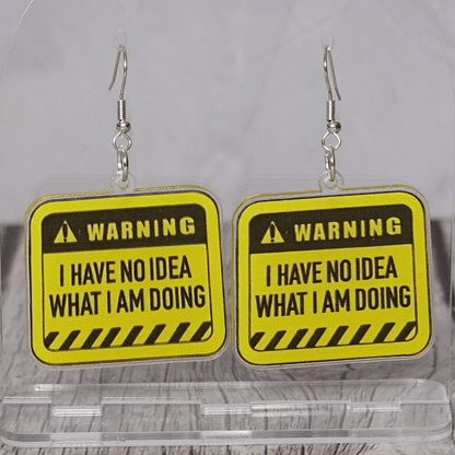 Yellow caution sign style dangle earrings with text “I have no idea what I’m doing”