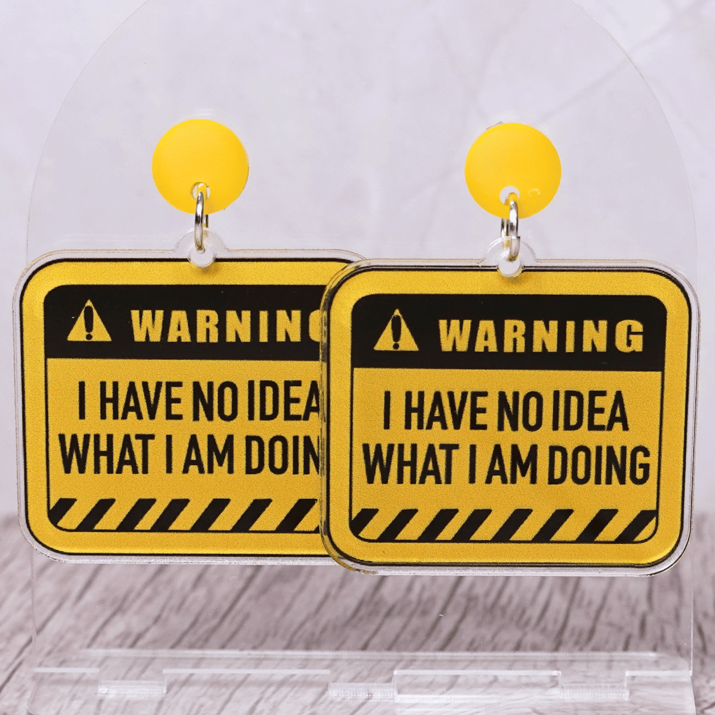 Yellow caution sign style dangle earrings with text “I have no idea what I’m doing”