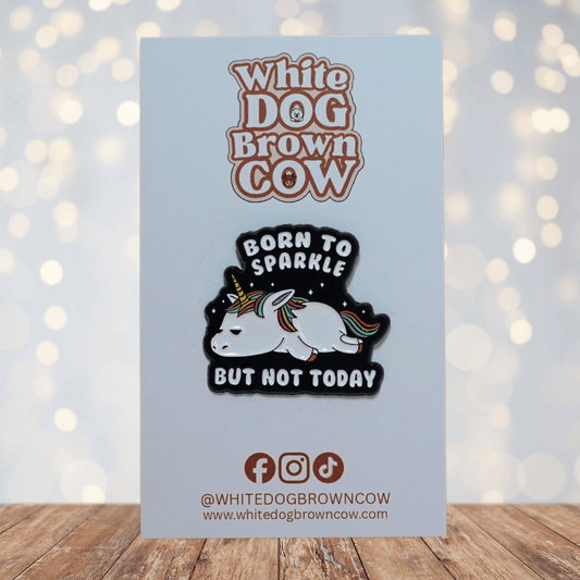 Unicorn enamel pin reading “Born to sparkle but not today