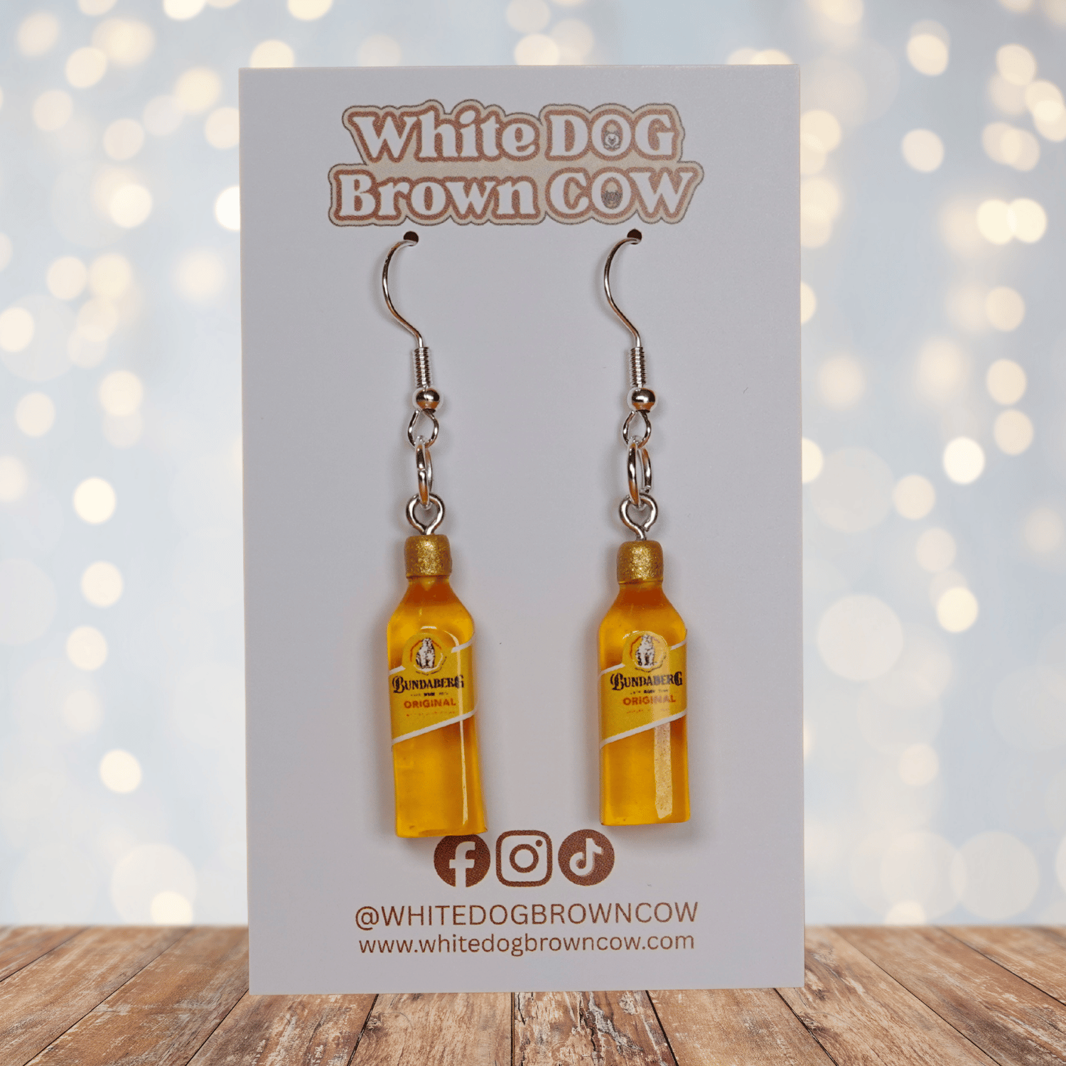 Mini Bundaberg style drink bottle dangle earrings with silver hooks