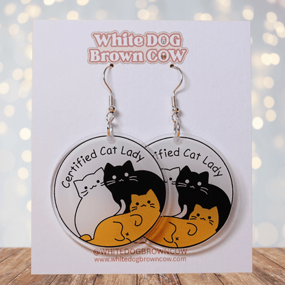 Round dangle earrings with cute cats and text “Certified Cat Lady”