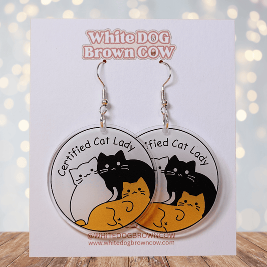 Round dangle earrings with cute cats and text “Certified Cat Lady”