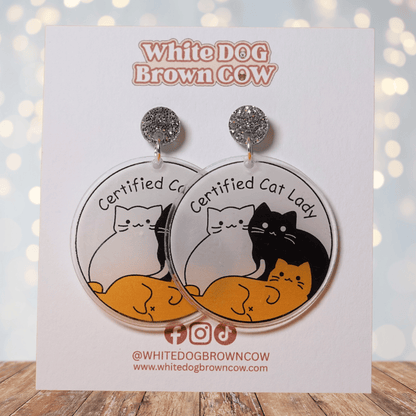 Round dangle earrings with cute cats and text “Certified Cat Lady”