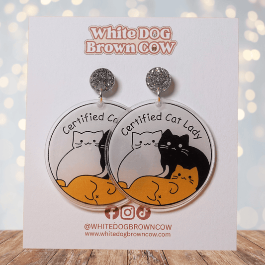 Round dangle earrings with cute cats and text “Certified Cat Lady”