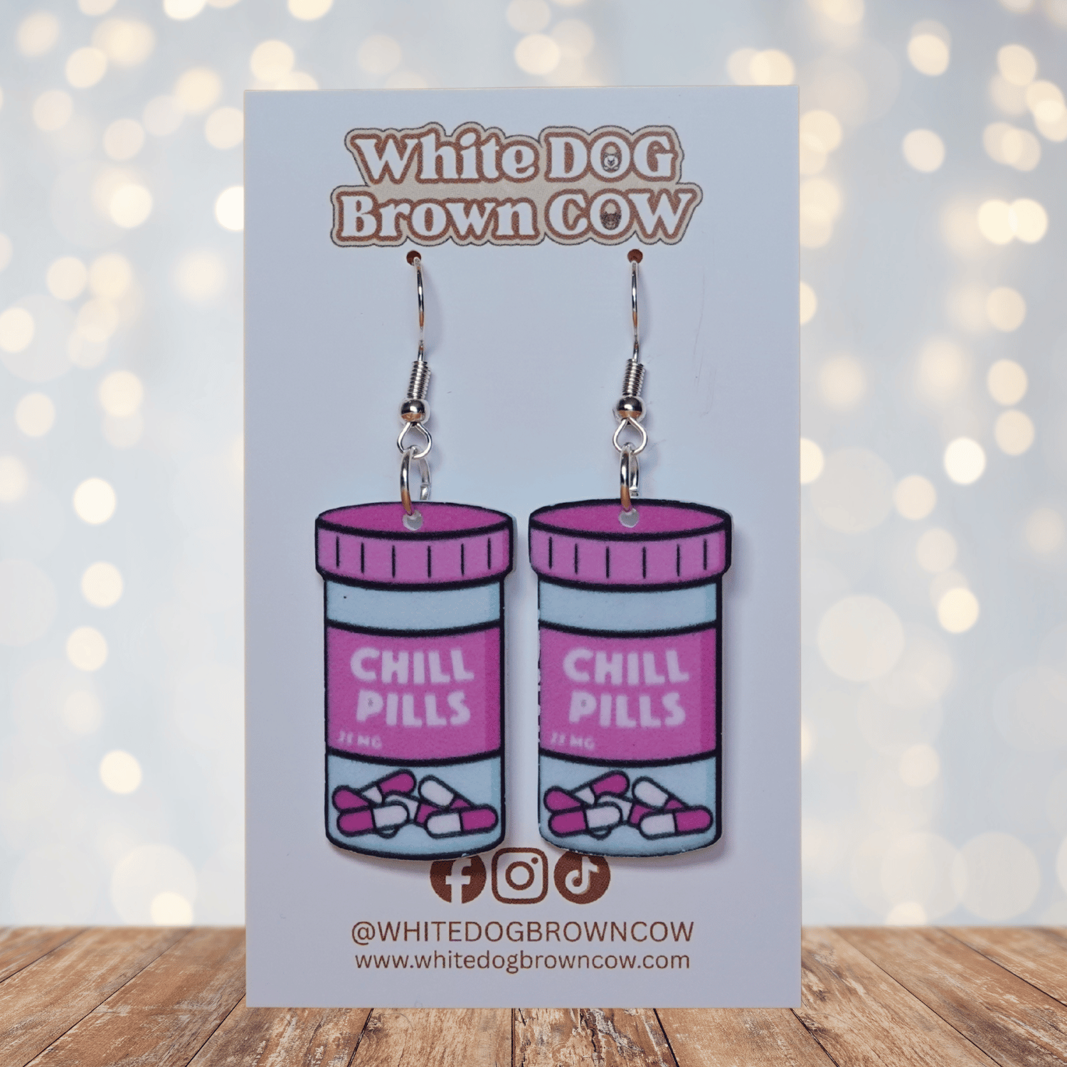 Pink Chill Pills novelty earrings
