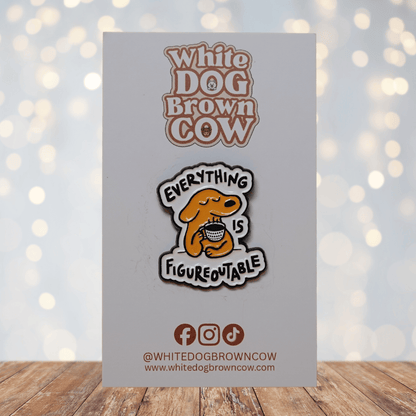 Cute enamel pin of a calm yellow dog holding a coffee cup with the phrase “Everything Is Figureoutable,” motivational coffee lover lapel pin.