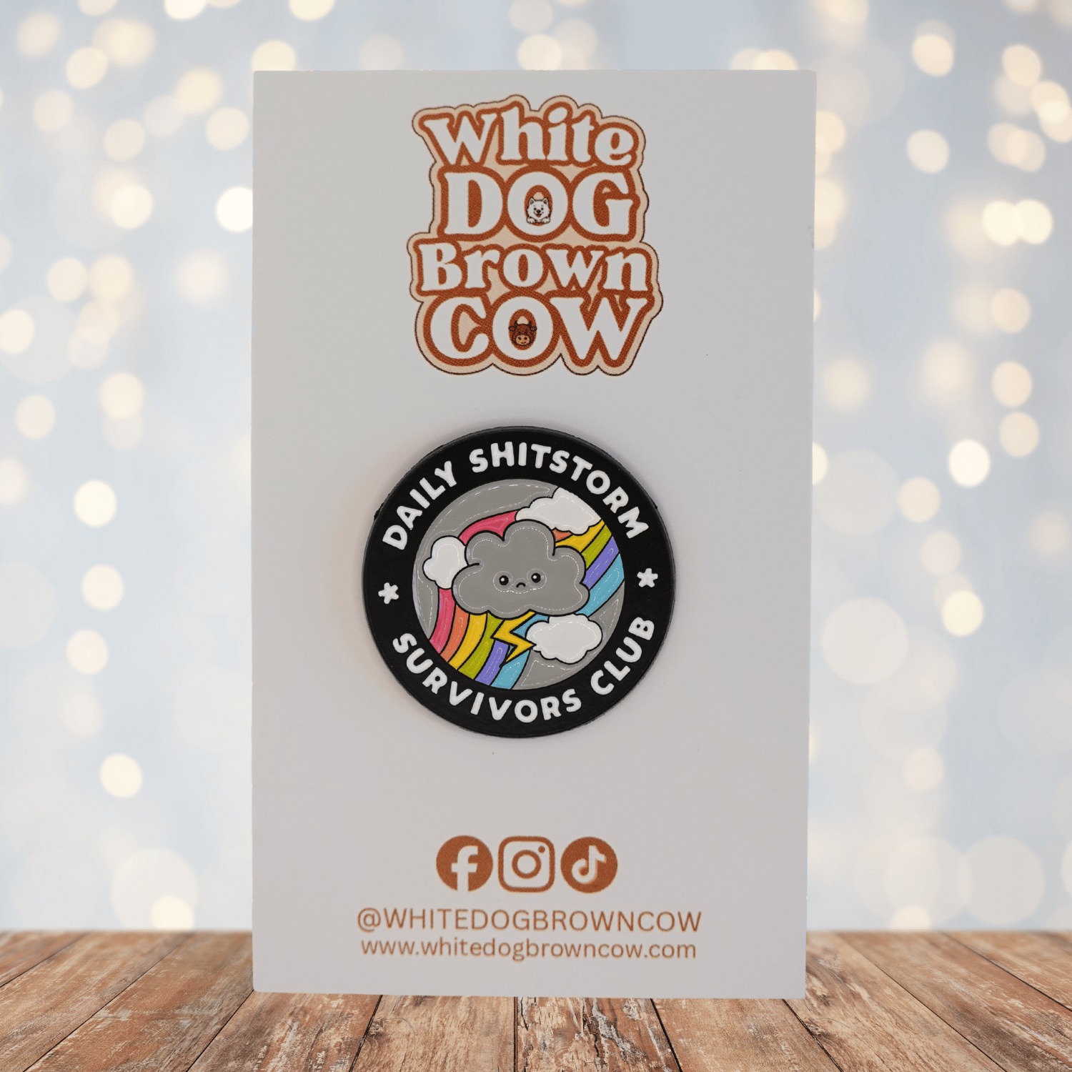 Funny sarcastic Daily Shitstorm Survivors Club enamel pin with storm cloud and rainbow design