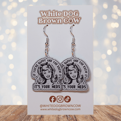 Black and white retro style earrings with woman illustration and text “If you’re happy and you know it it’s your meds”