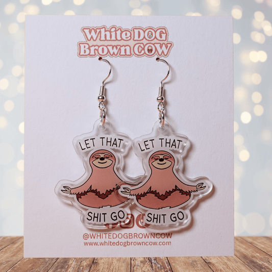Cute sloth dangle earrings in meditation pose with text “let that shit go”