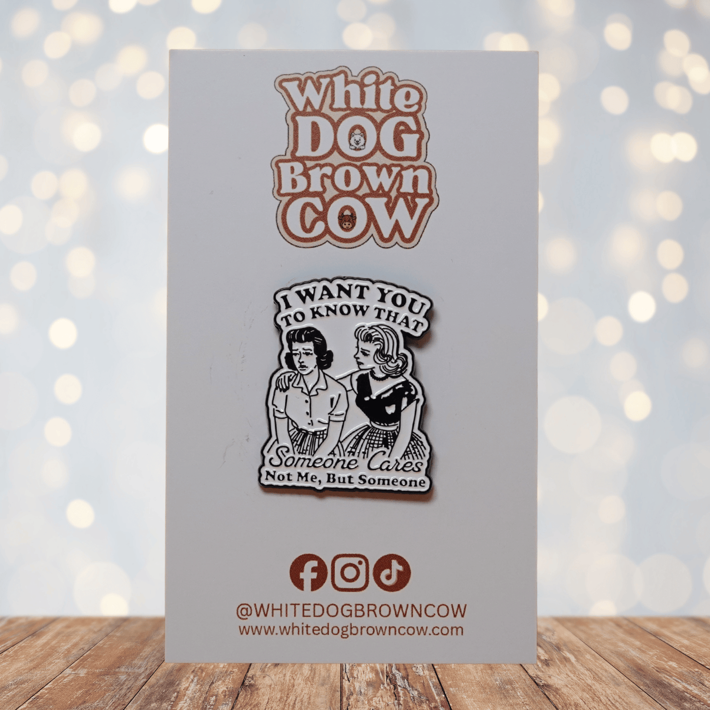 Retro black and white enamel pin with two women illustration and quote “I Want You To Know That Someone Cares, Not Me, But Someone,” sarcastic humor lapel pin.