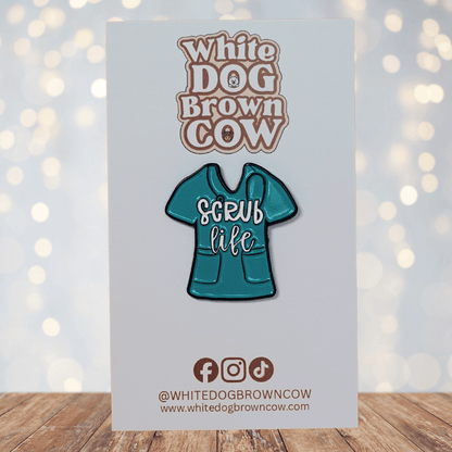 Funny “Scrub Life” enamel pin shaped like teal medical scrubs for nurses and healthcare workers