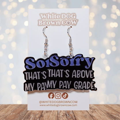 Black novelty dangle earrings with text “sorry that’s above my pay grade”