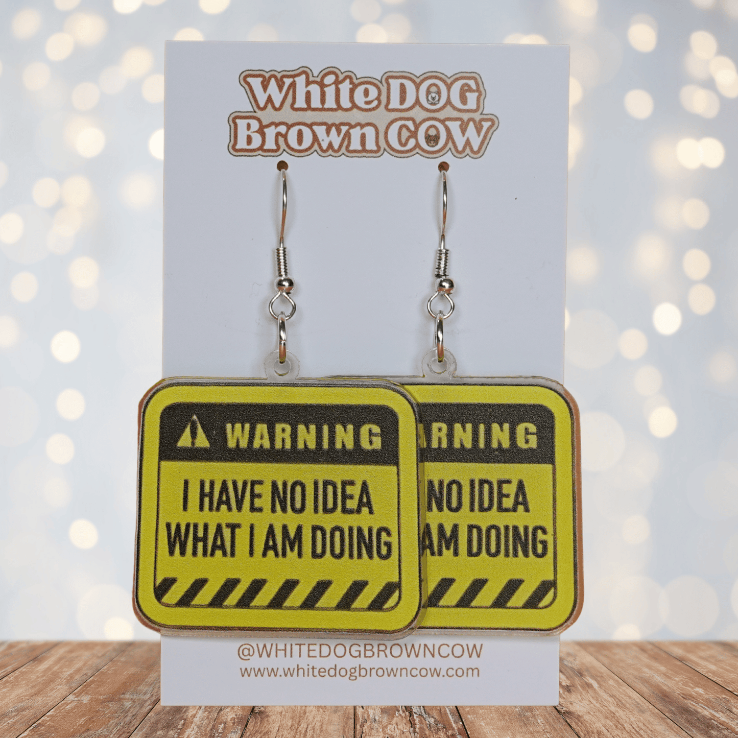 Yellow caution sign style dangle earrings with text “I have no idea what I’m doing”