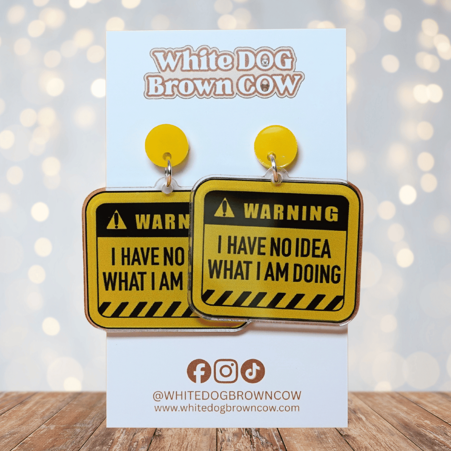 Yellow caution sign style dangle earrings with text “I have no idea what I’m doing”