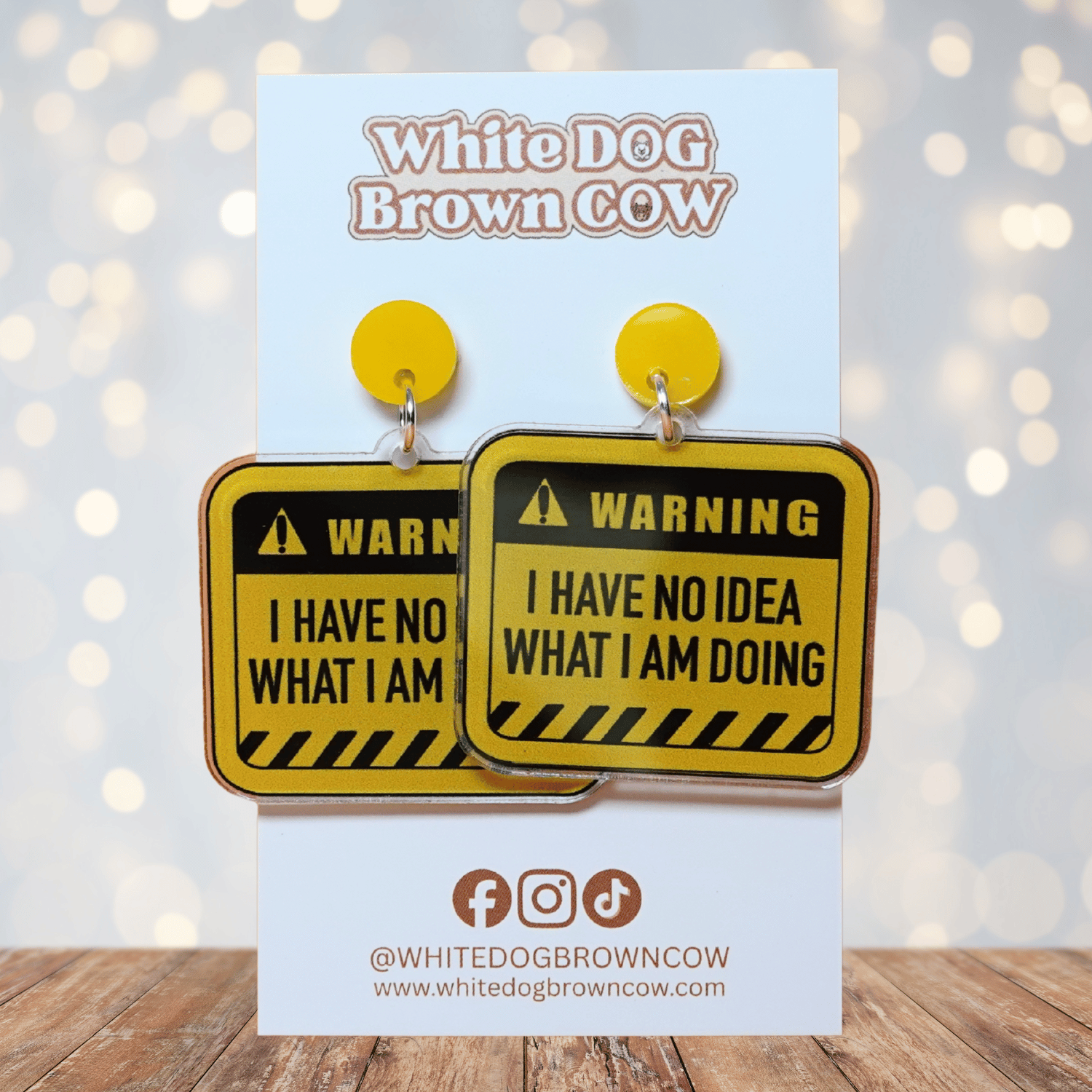 Yellow caution sign style dangle earrings with text “I have no idea what I’m doing”