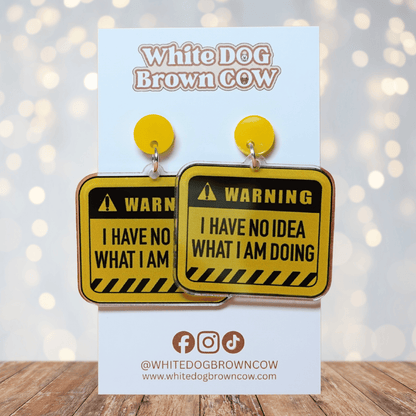 Yellow caution sign style dangle earrings with text “I have no idea what I’m doing”